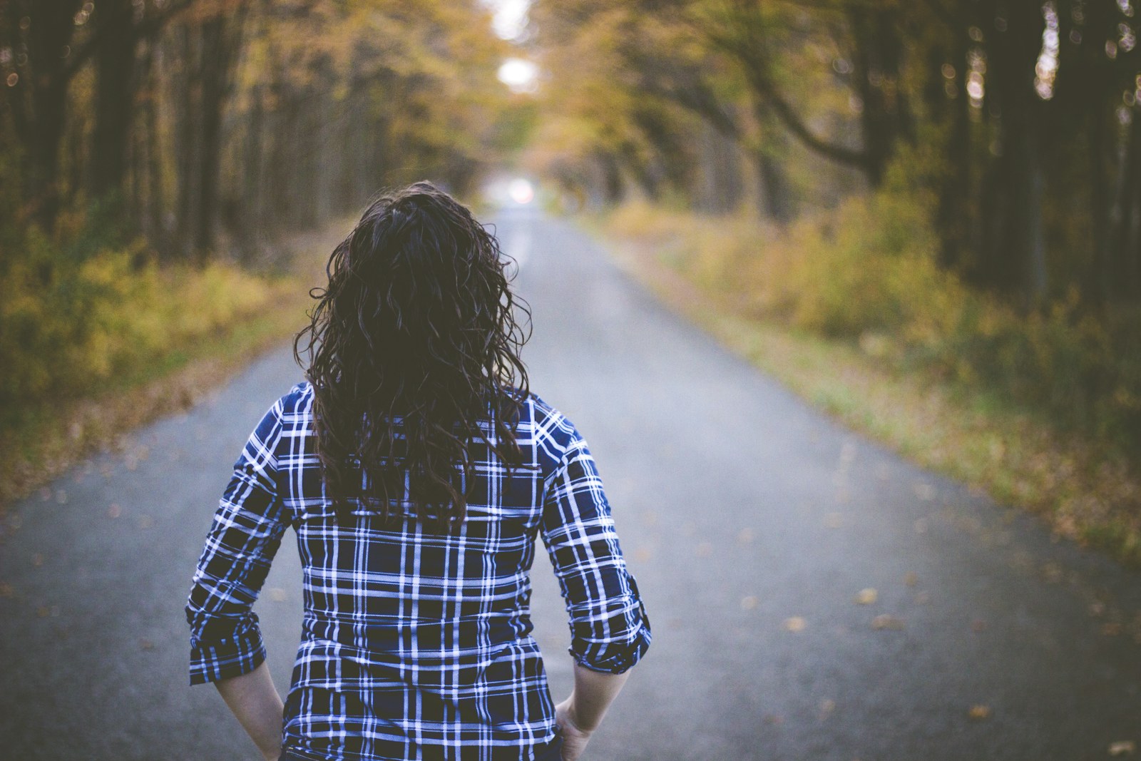 A woman moving confidently through a city