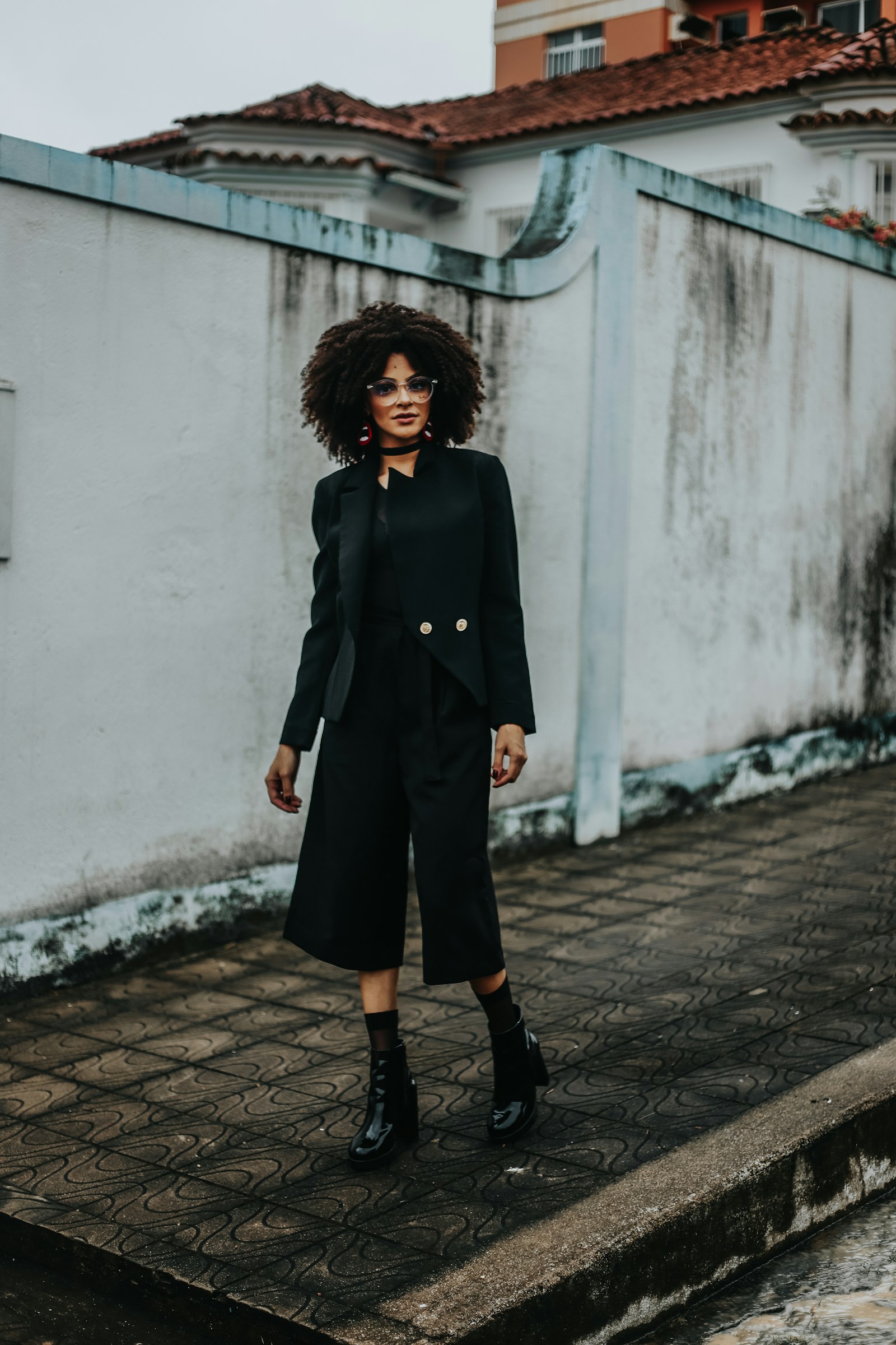 A woman walking outdoors with purpose